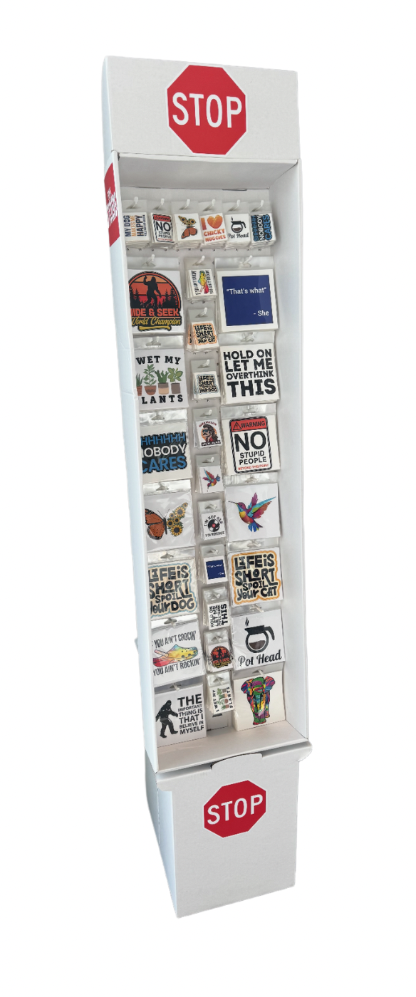 Vinyl sticker display box featuring assorted large and small stickers in a peggable floor-ready wholesale display for retail stores